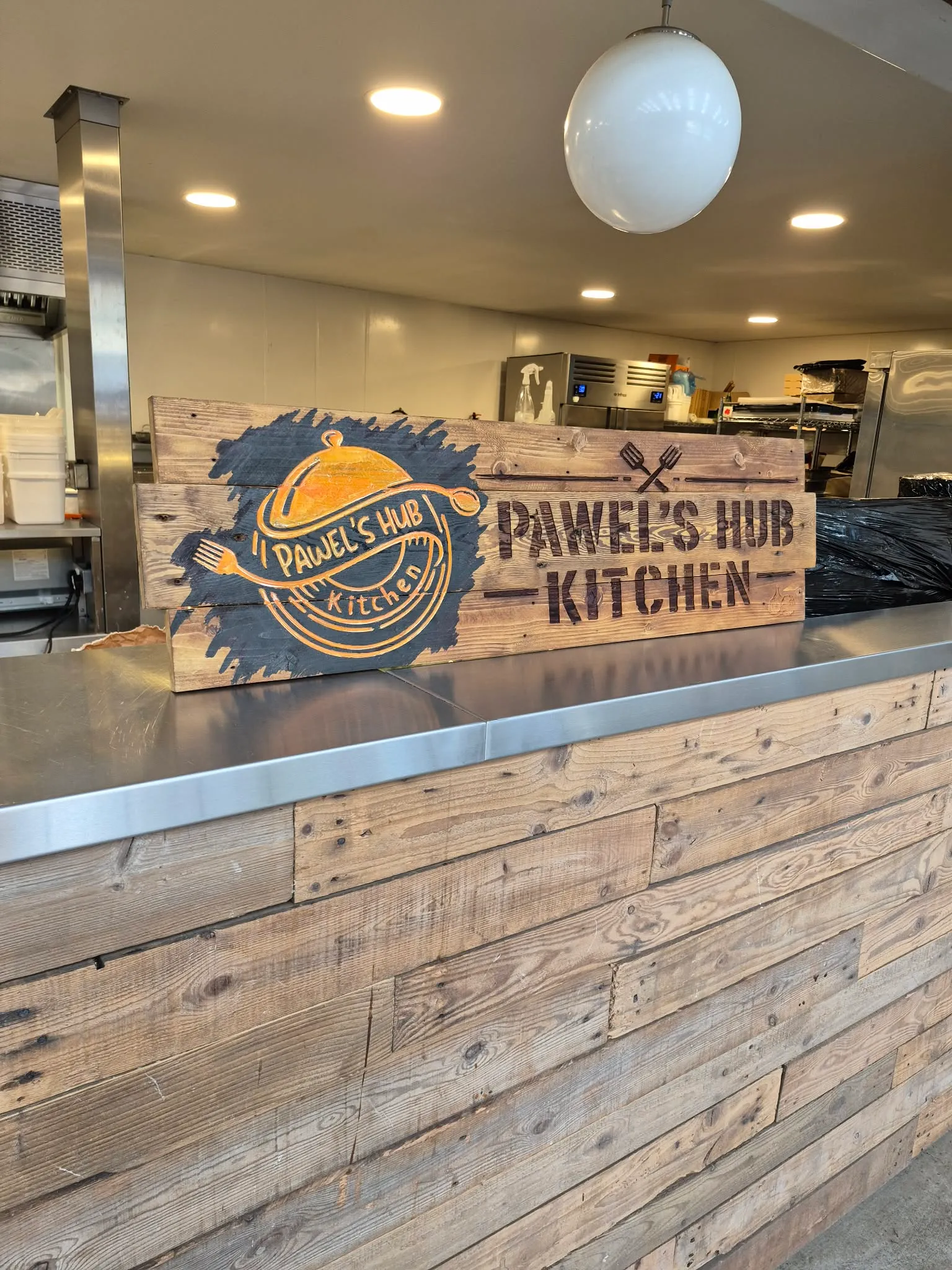 Pawel's HUB Kitchen sign